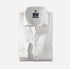 Folded white Olymp shirt on a light gray background