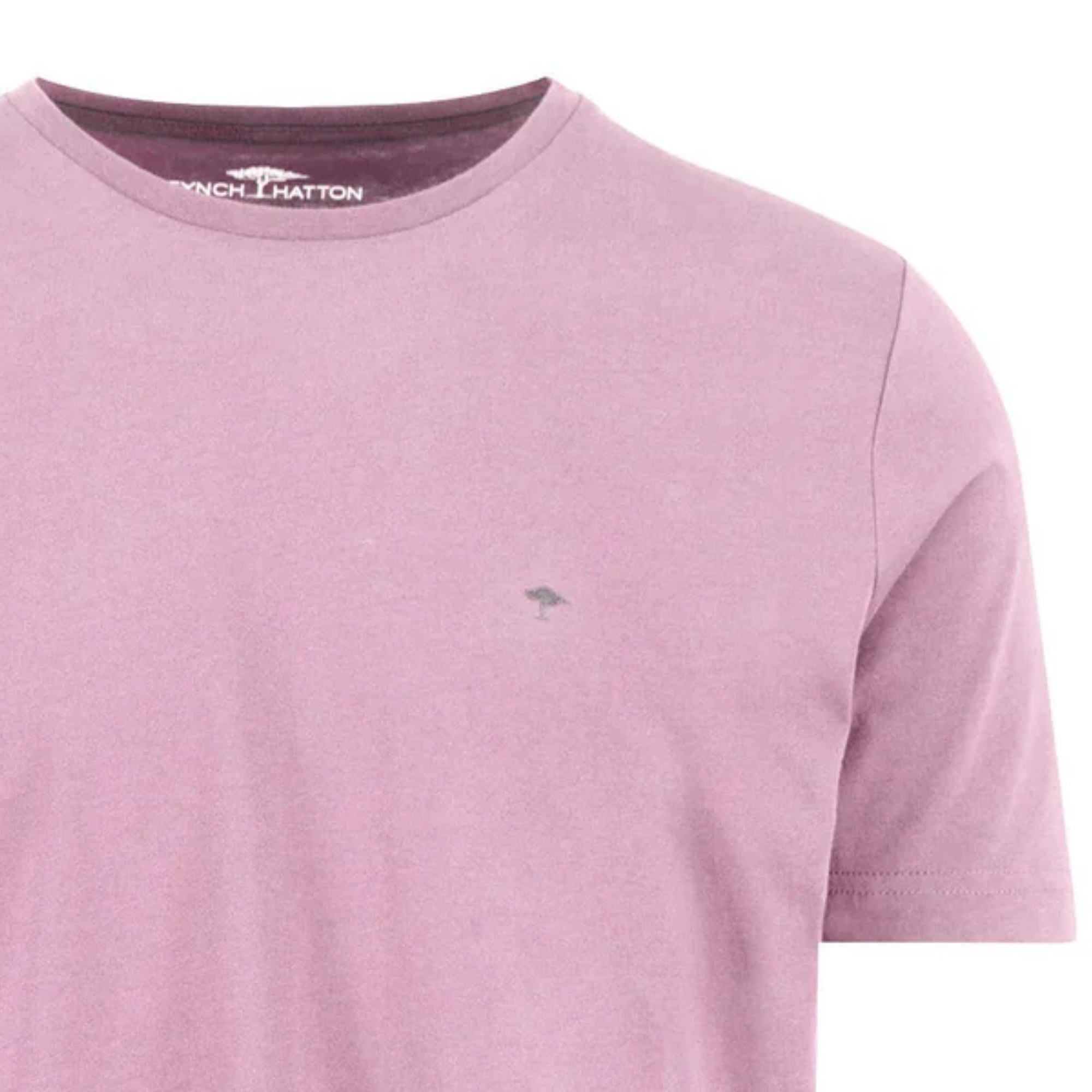 Pink t-shirt with a small logo on a white background