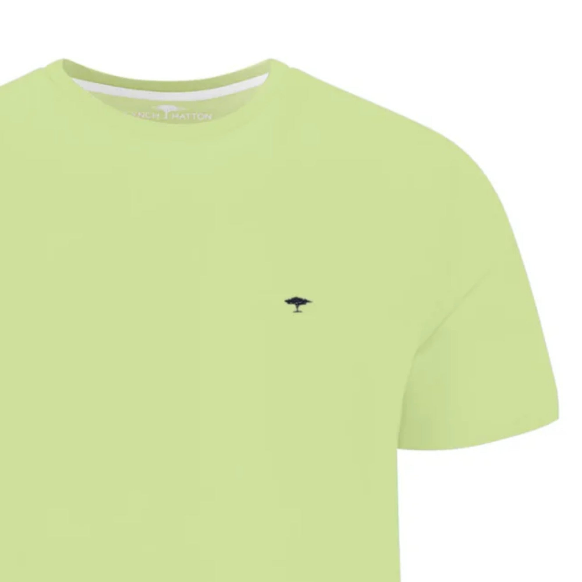 Light green t-shirt with a small black logo on a white background
