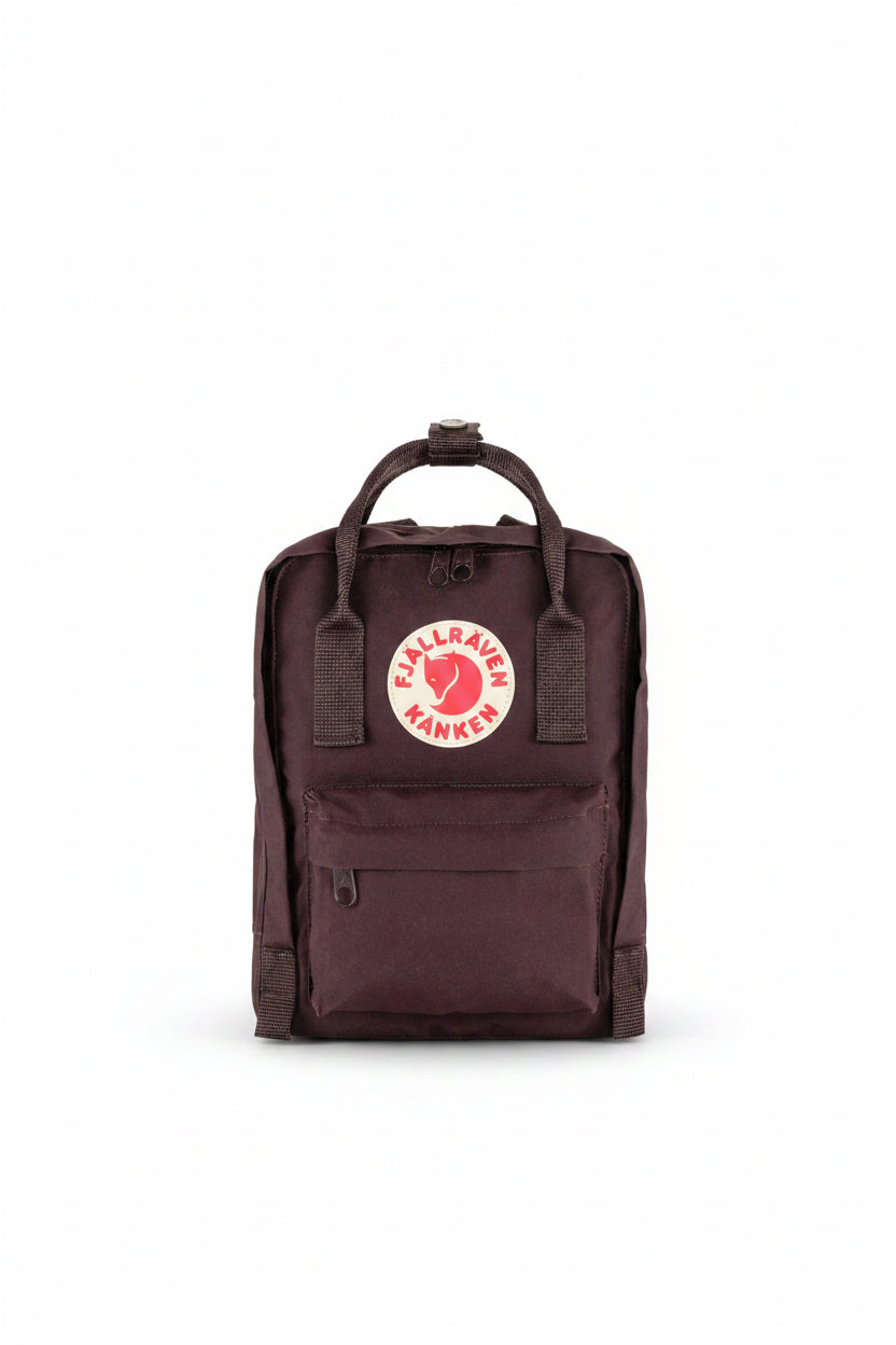 Burgundy backpack with Fjällräven Kånken logo on a white background
