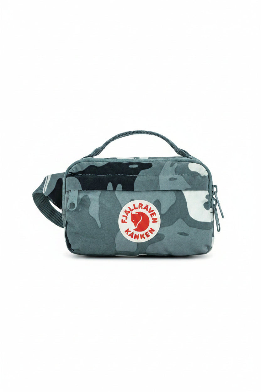 Camouflage-patterned bag with Fjällräven Kånken logo on a white background