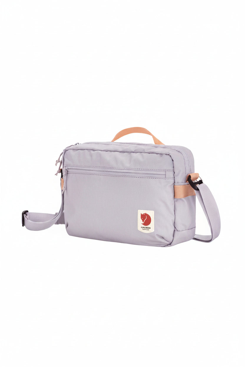 Lavender bag with a visible brand logo on a white background