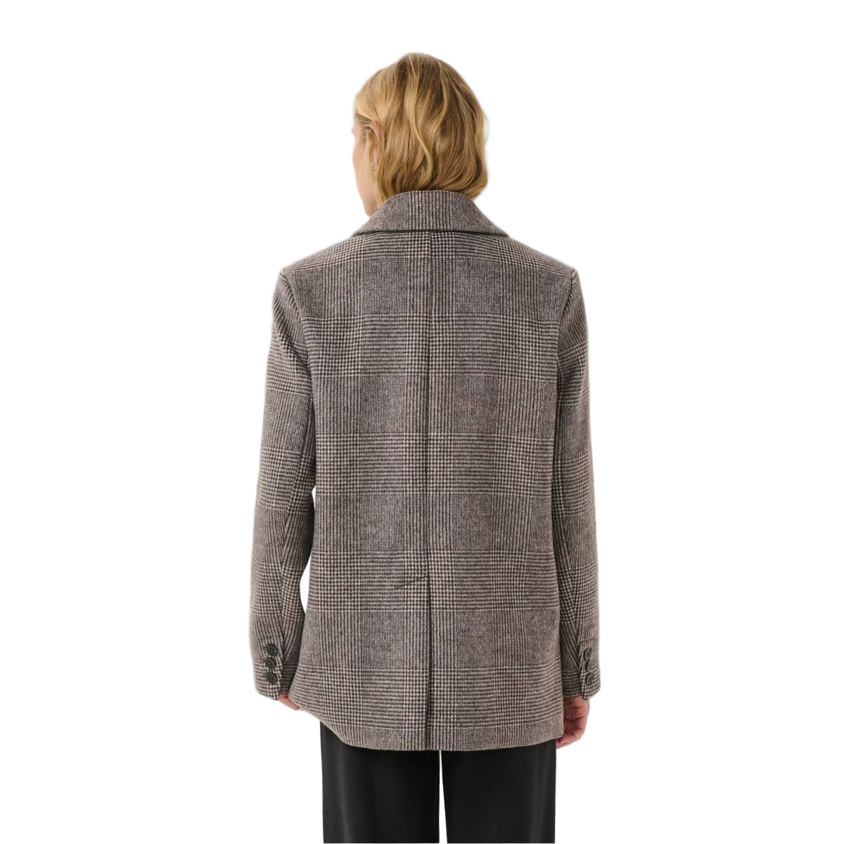 Person wearing a gray checkered coat on a white background