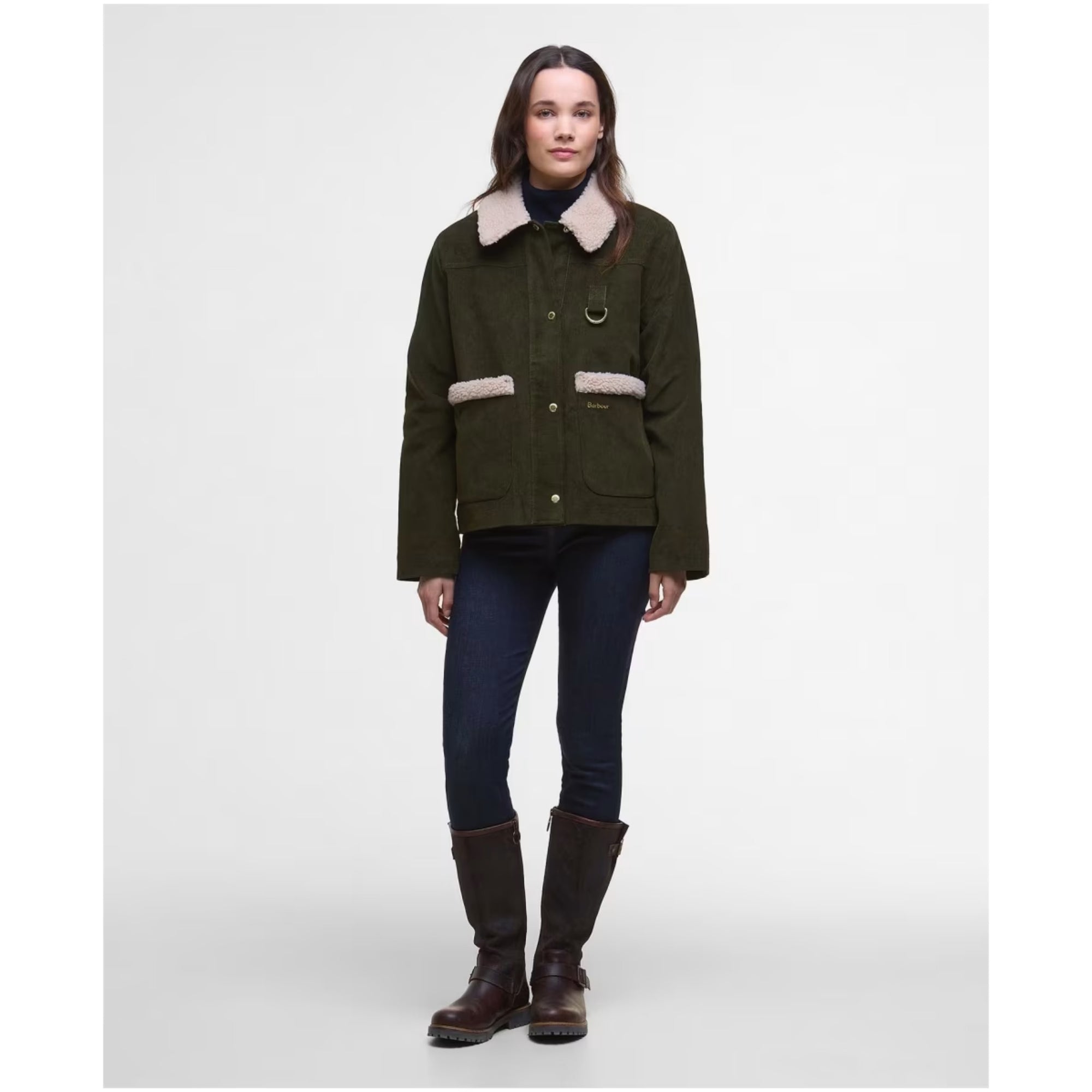 Woman wearing a green jacket with fur collar on a white background