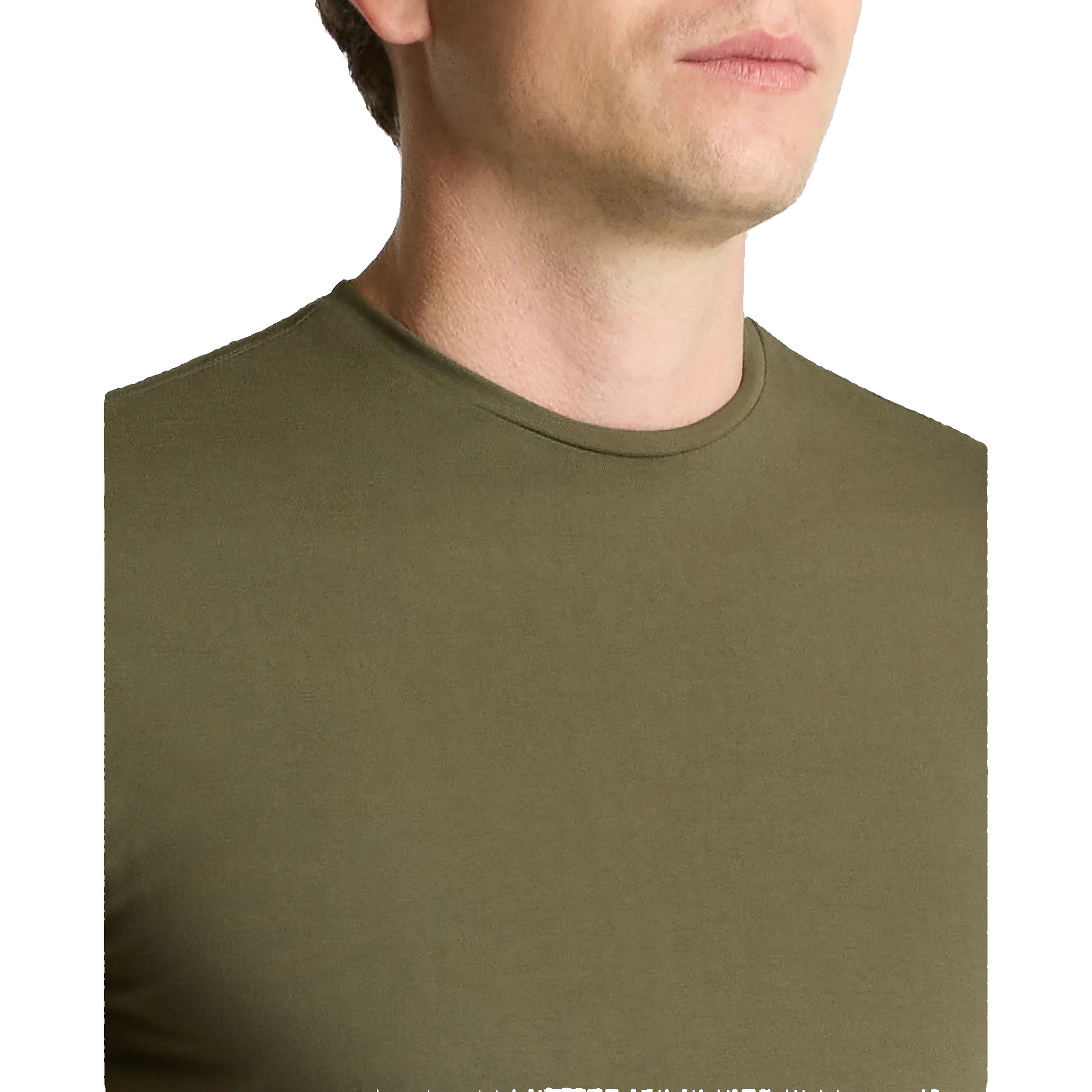 Close-up of a person wearing an olive green t-shirt against a plain background
