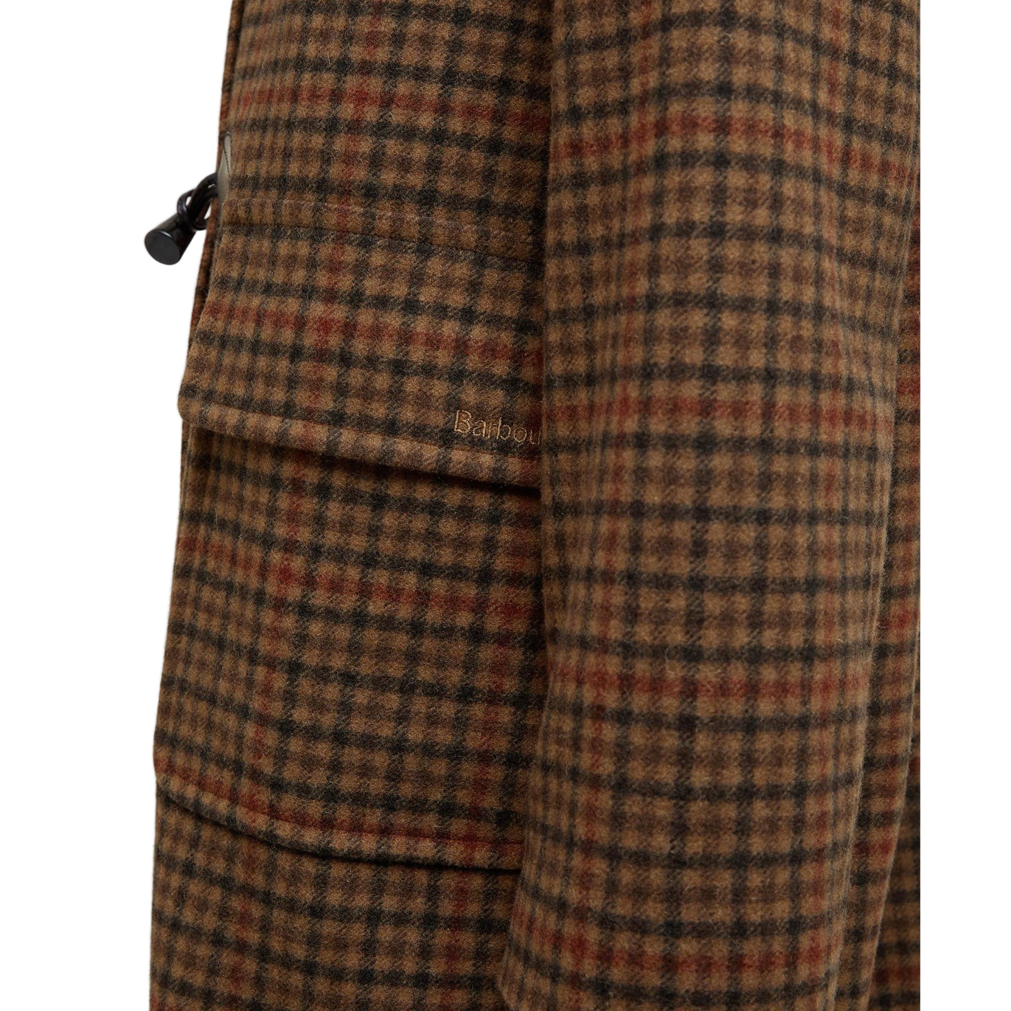 Plaid patterned fabric with a visible brand label on a white background