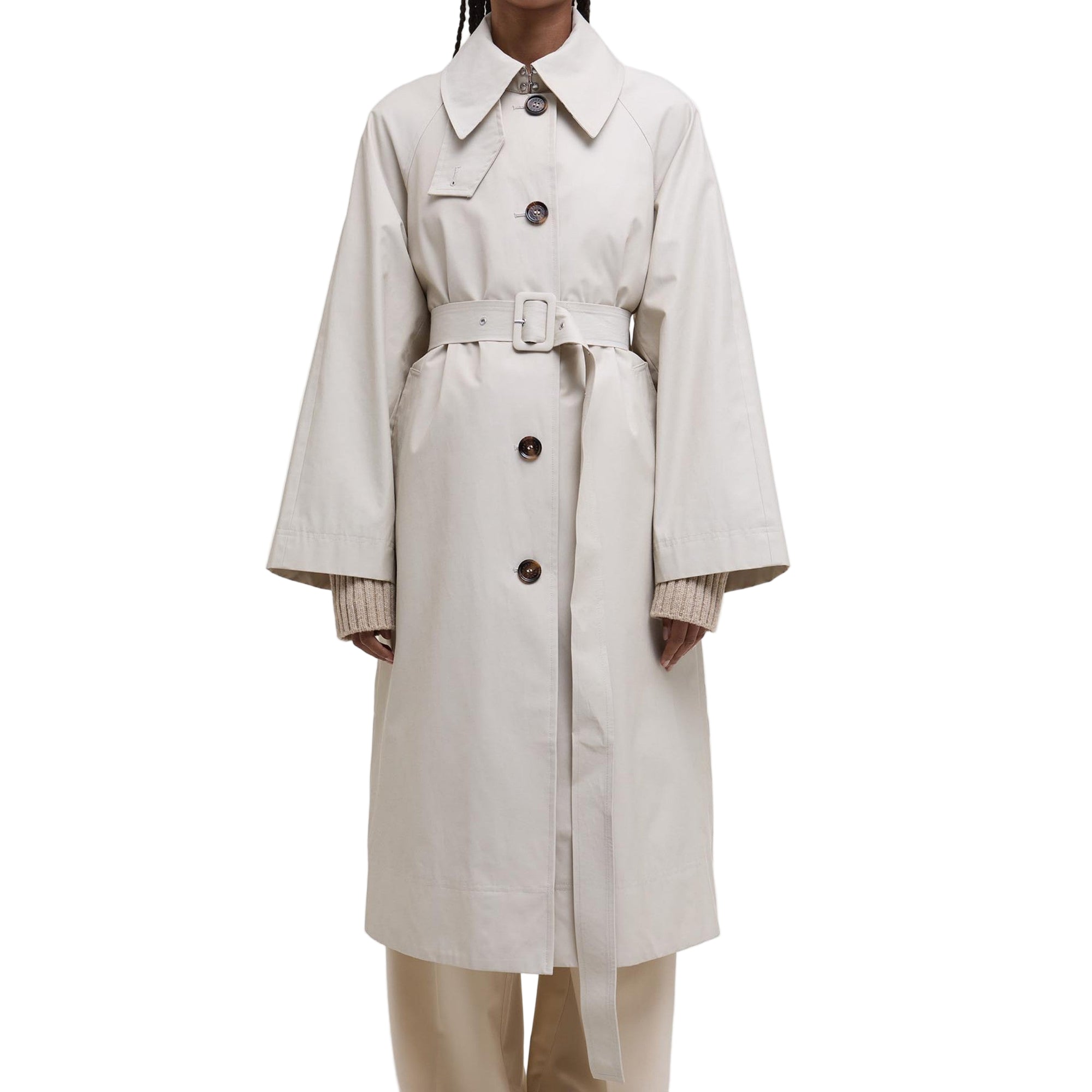 Beige trench coat with buttons on a white background