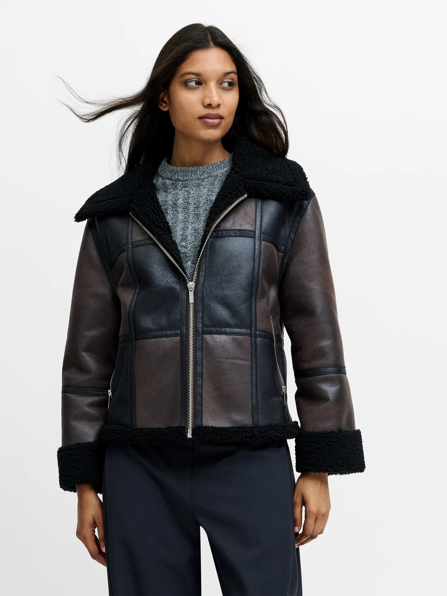 A woman wearing French Connection Camry Brown Faux Suede Faux Shearling Aviator Jacket