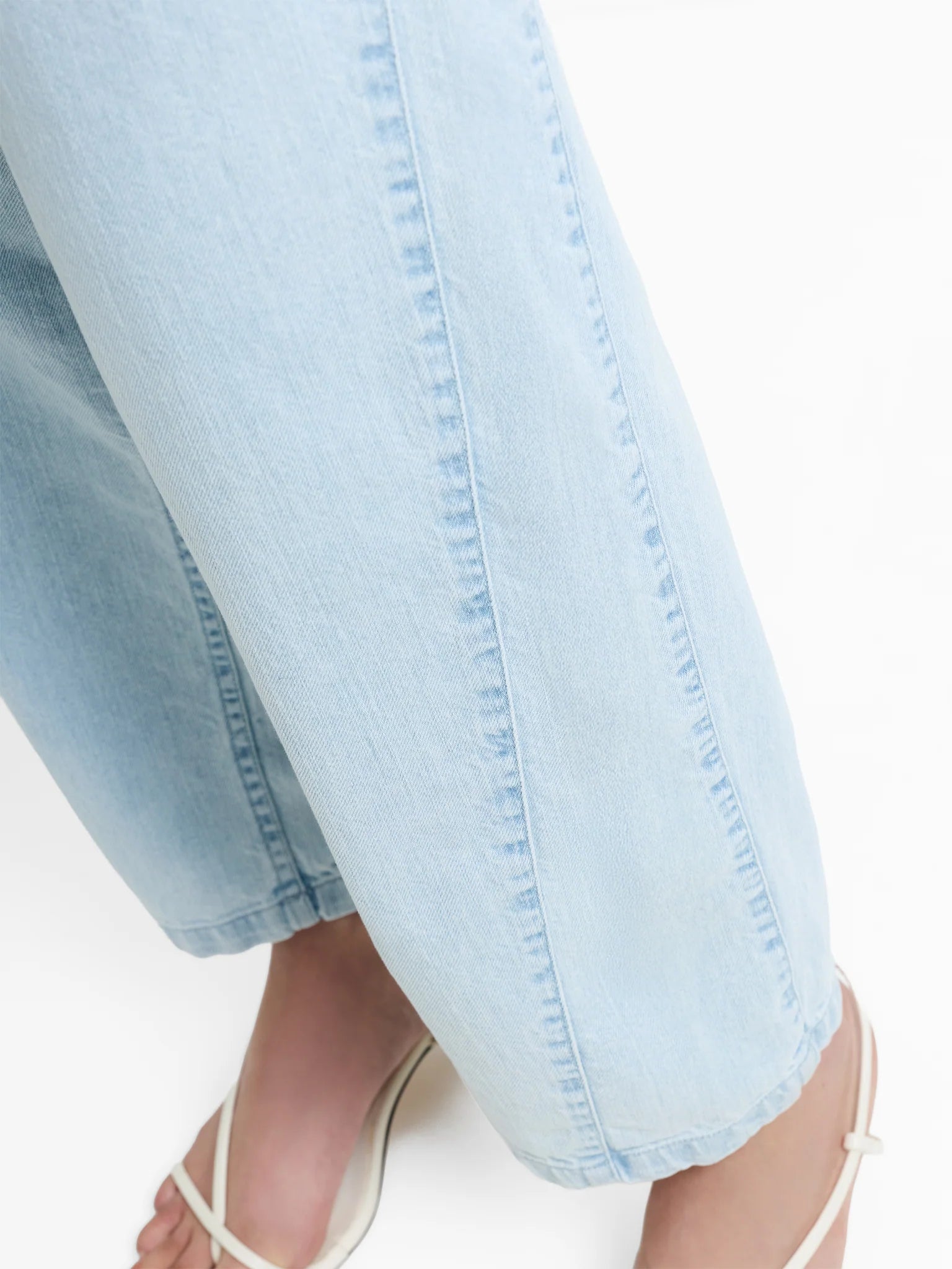 Light blue jeans on a white background
