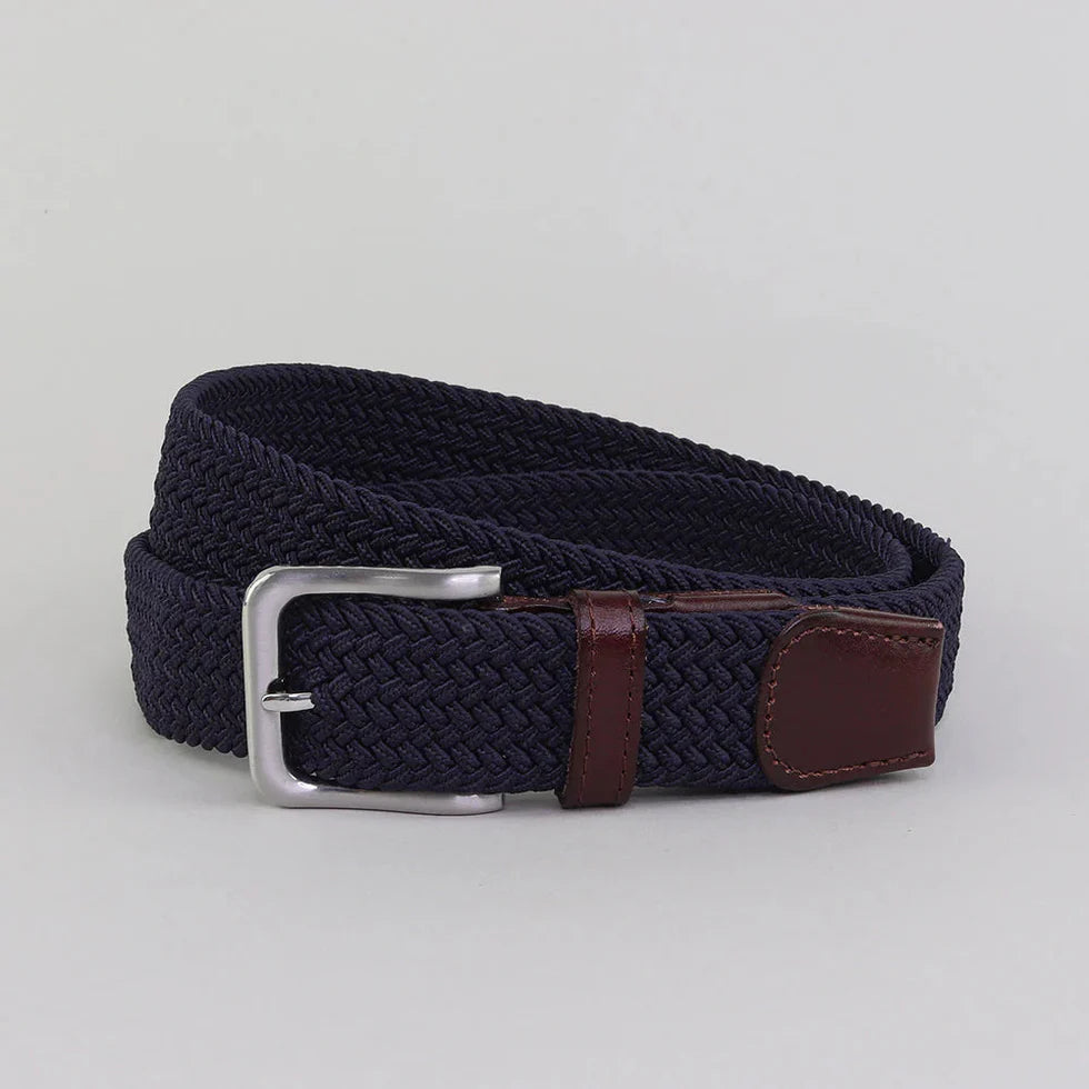 Navy woven belt with a silver buckle and brown leather tab on a light gray background