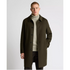Man wearing a Remus Uomo green coat over a light sweater on a white background