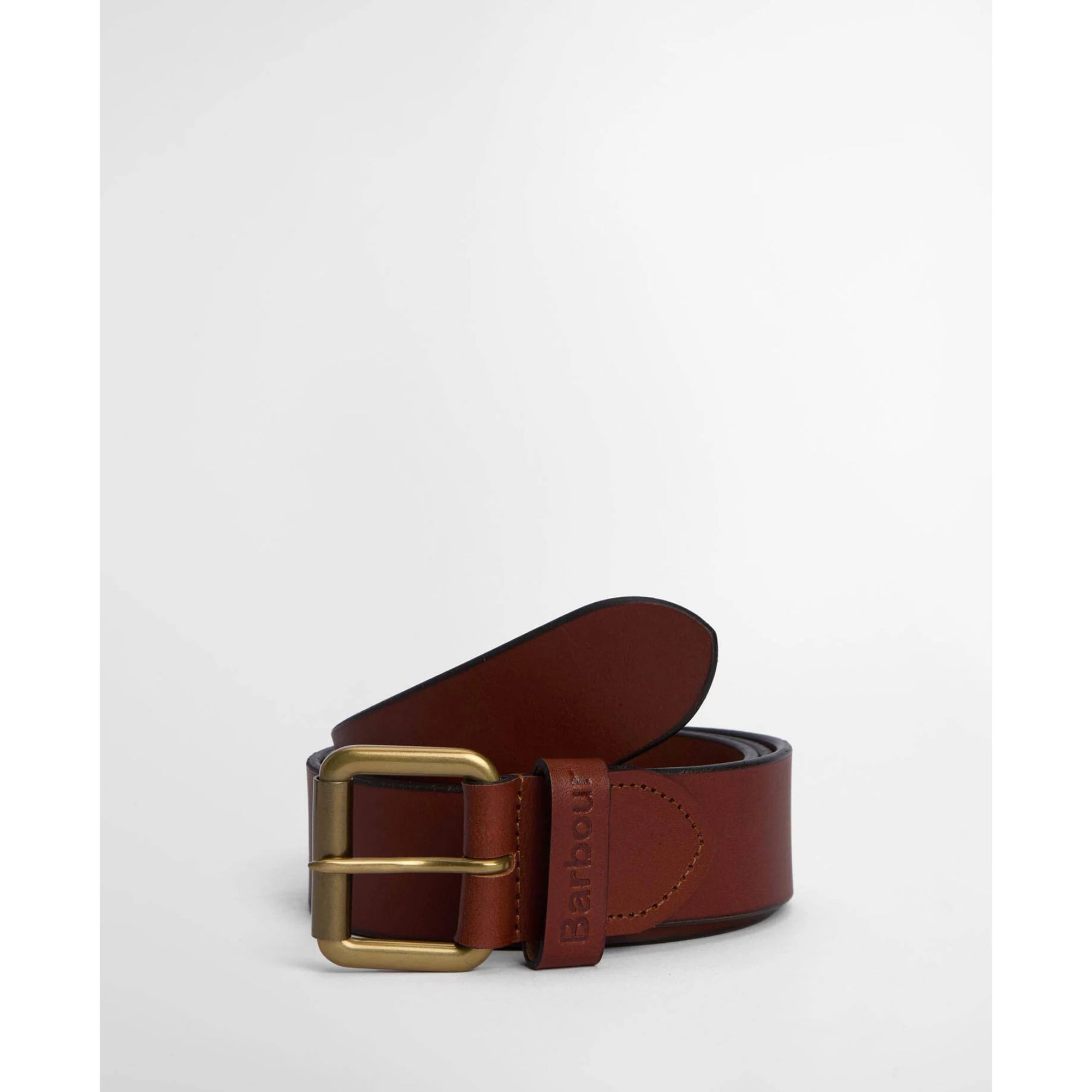 Brown leather belt with brass buckle on a white background