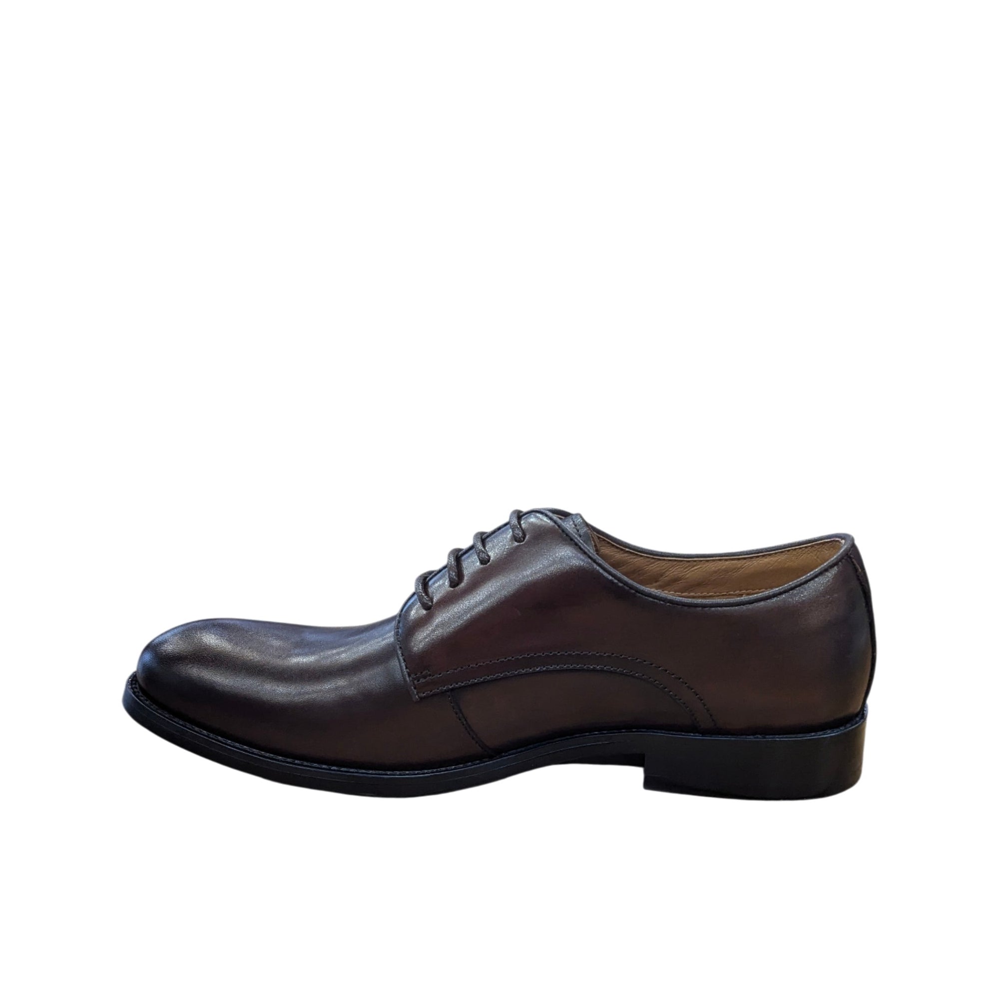 Brown leather dress shoe on a white background