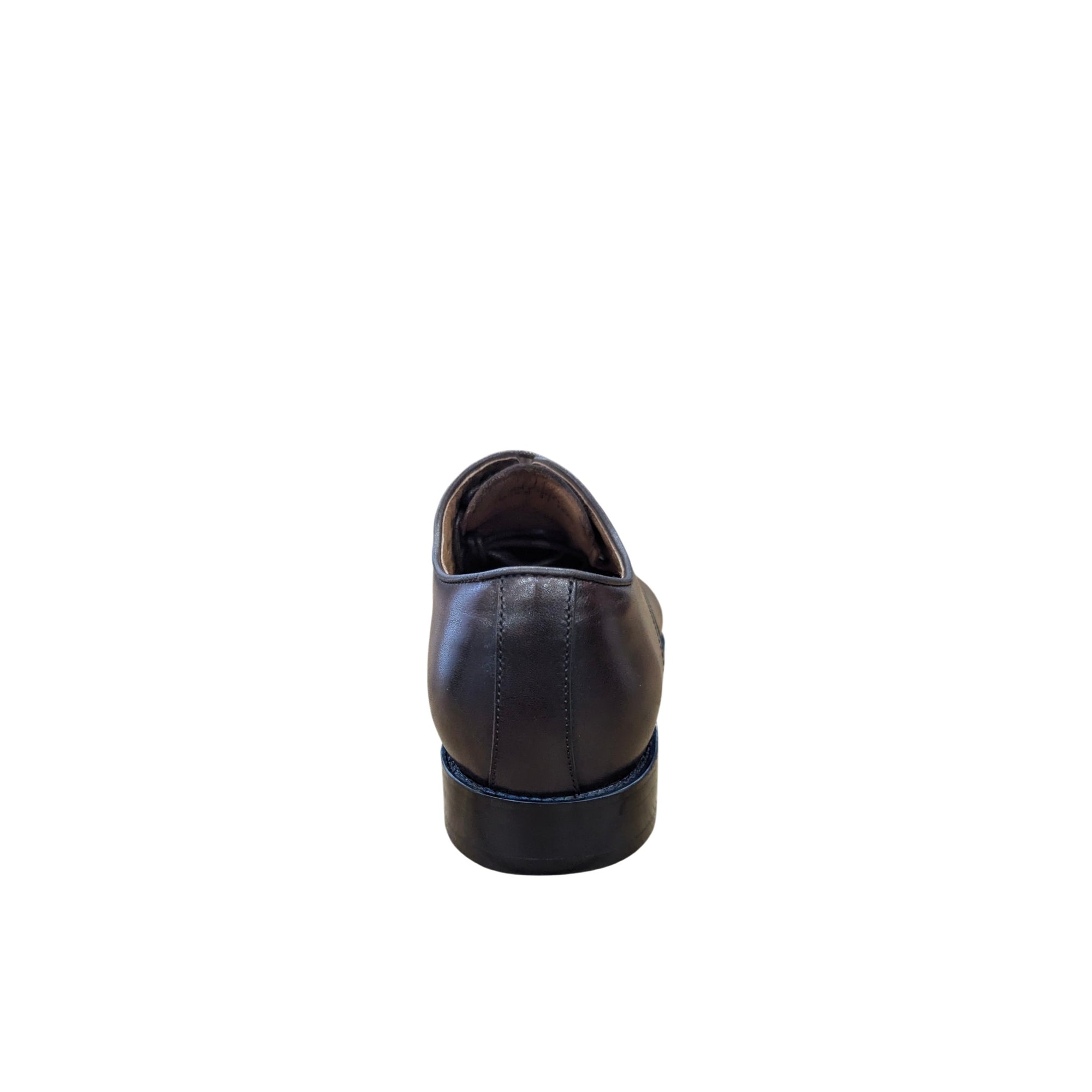 Black leather shoe on a white background