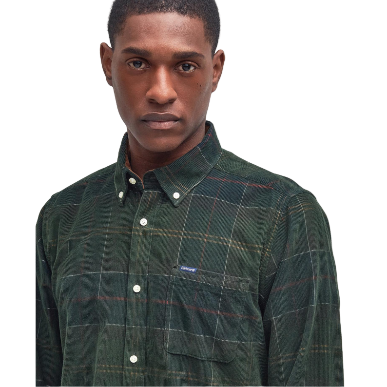 Man wearing a green Barbour plaid shirt close up