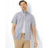 Man wearing a short-sleeve button-up shirt and beige pants on a white background