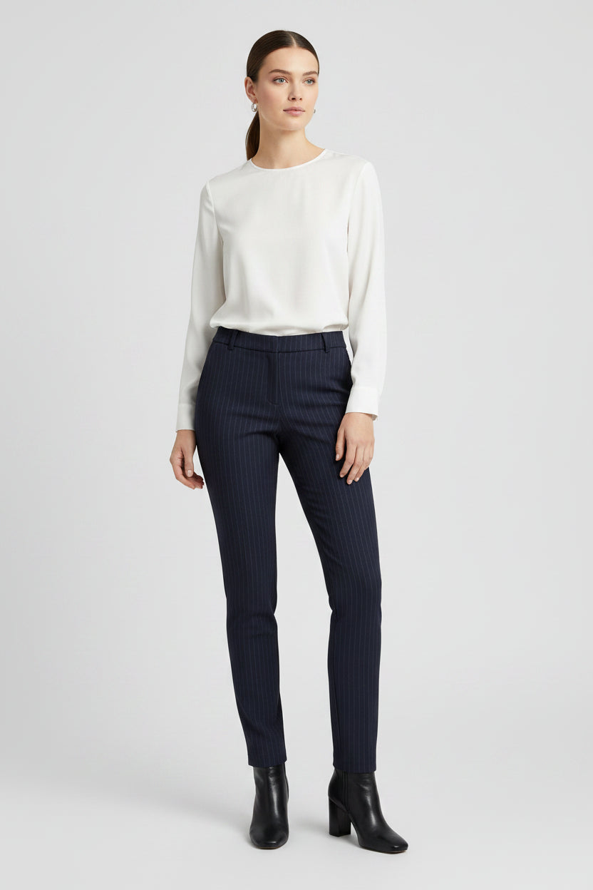 Navy pinstripe pants on a white background