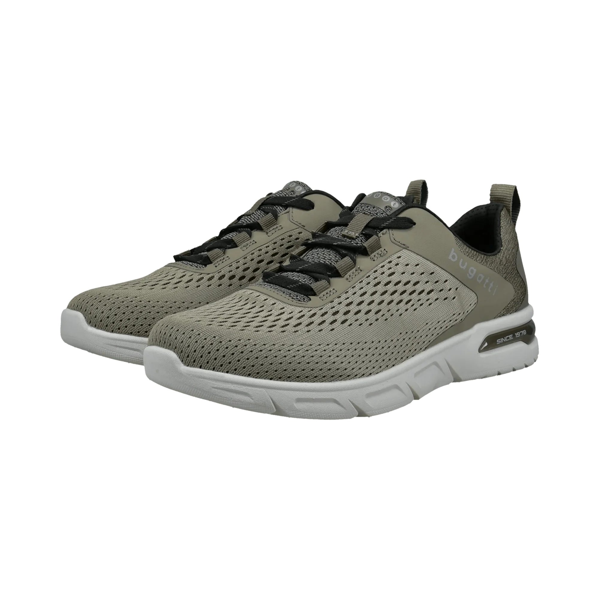 Pair of Sage green athletic shoes with black accents on a white background