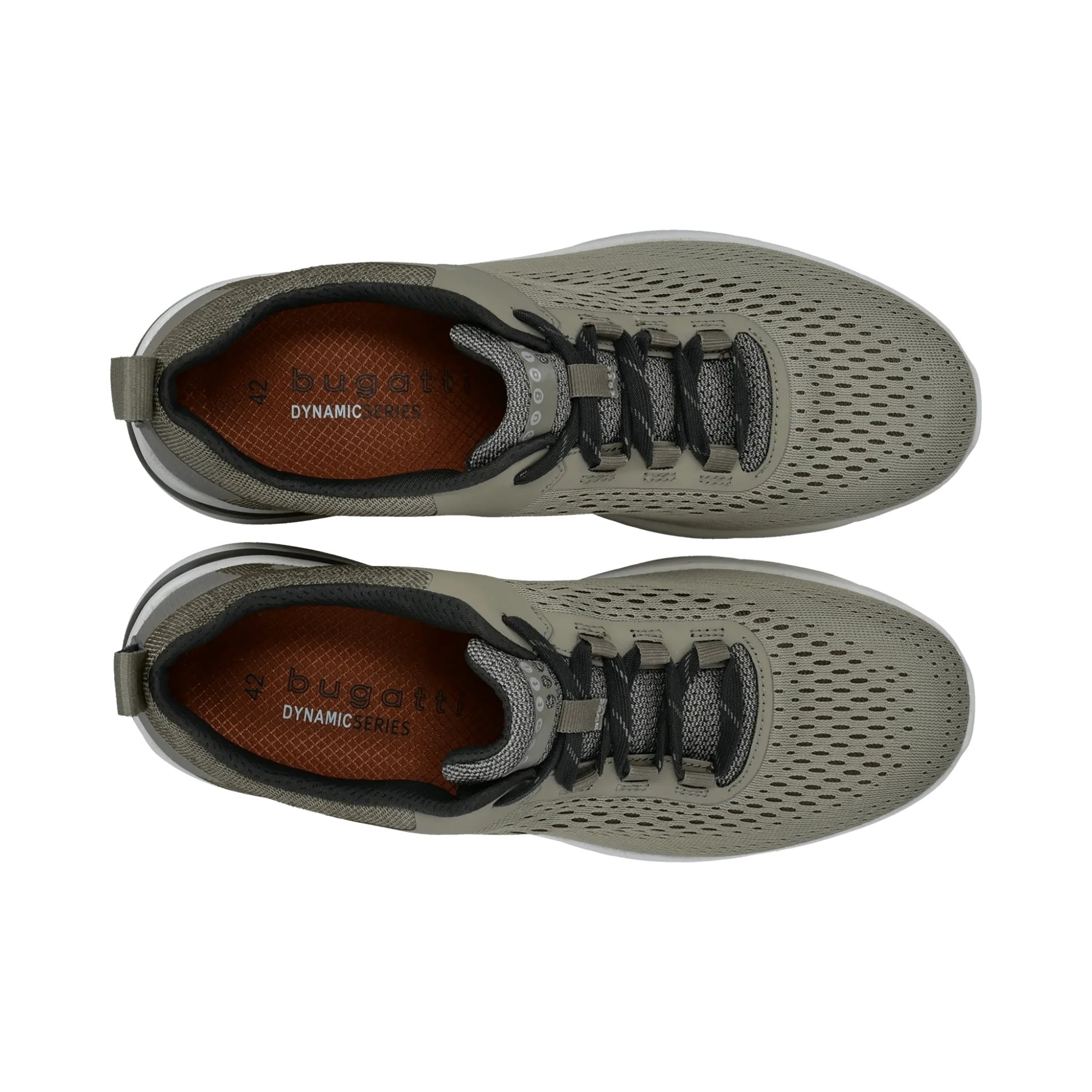 Pair of green running shoes with brown soles on a white background