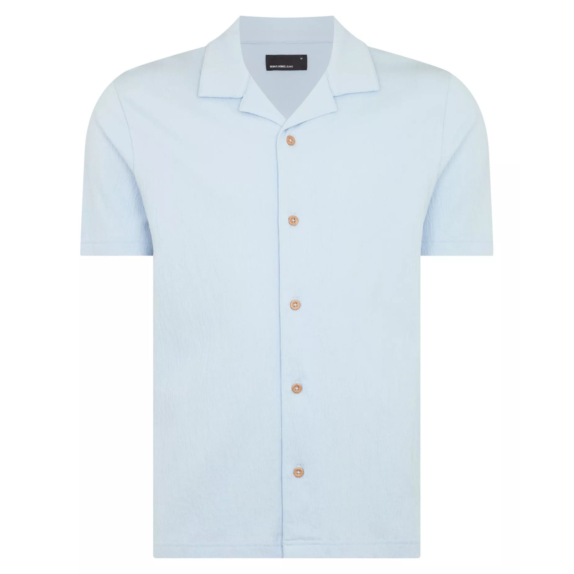 Light blue shirt with orange buttons on a white background