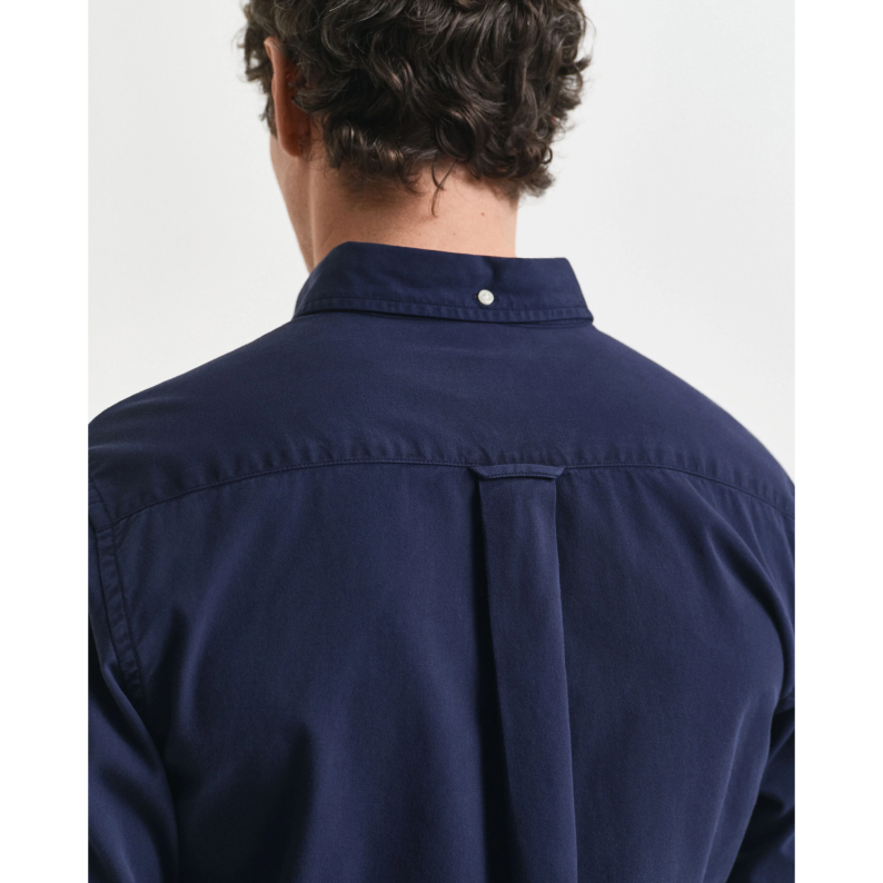 GANT Navy blue shirt worn by a person on a white background