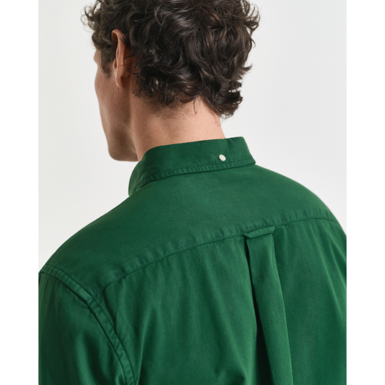 GANT Green shirt worn by a person on a white background