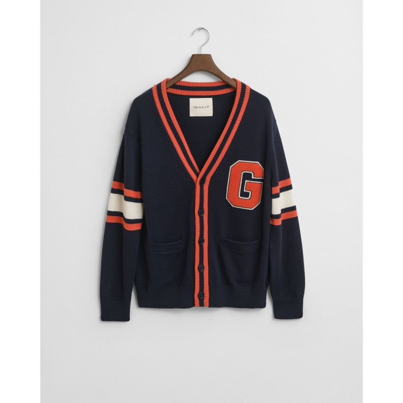 Navy GANT cardigan with orange and white accents on a hanger against a white background