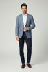 Blue blazer with floral lining and colorful buttons on a white background