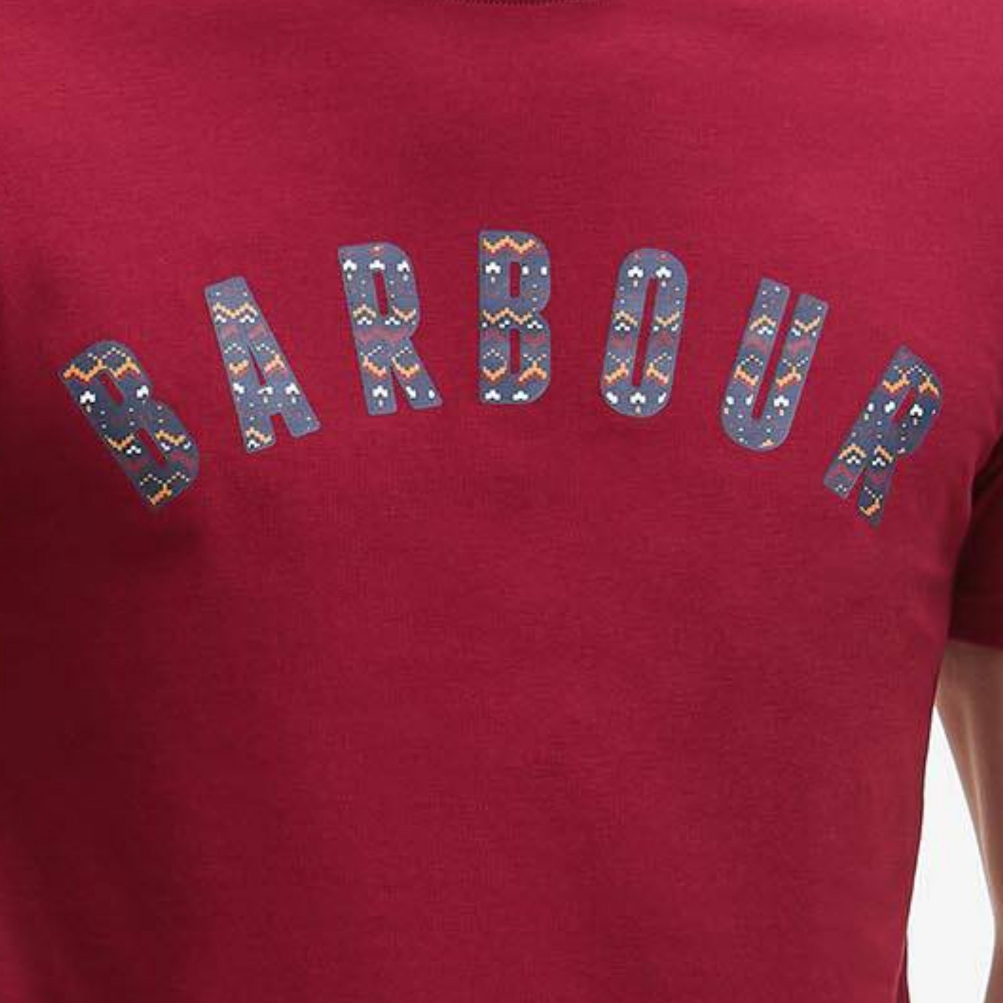 Red t-shirt with &#39;Barbour&#39; logo featuring a patterned design on a white background