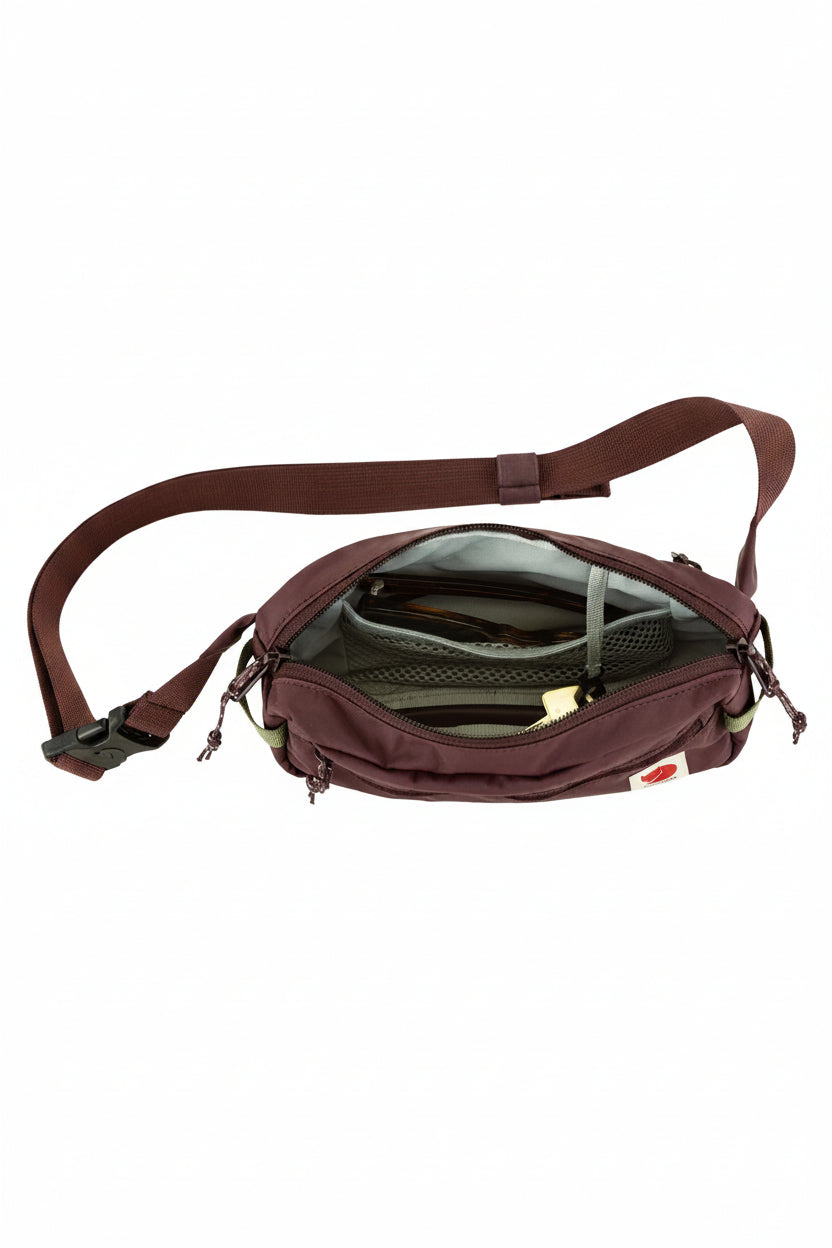 Blackberry waist bag with a strap on a white background