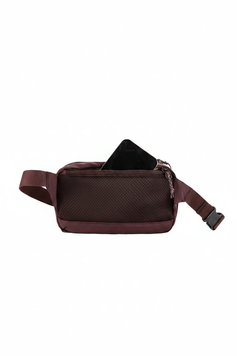 Blackberry waist bag with a phone inside on a white background