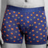 Blue boxer briefs with colorful hot air balloon pattern worn by a person.