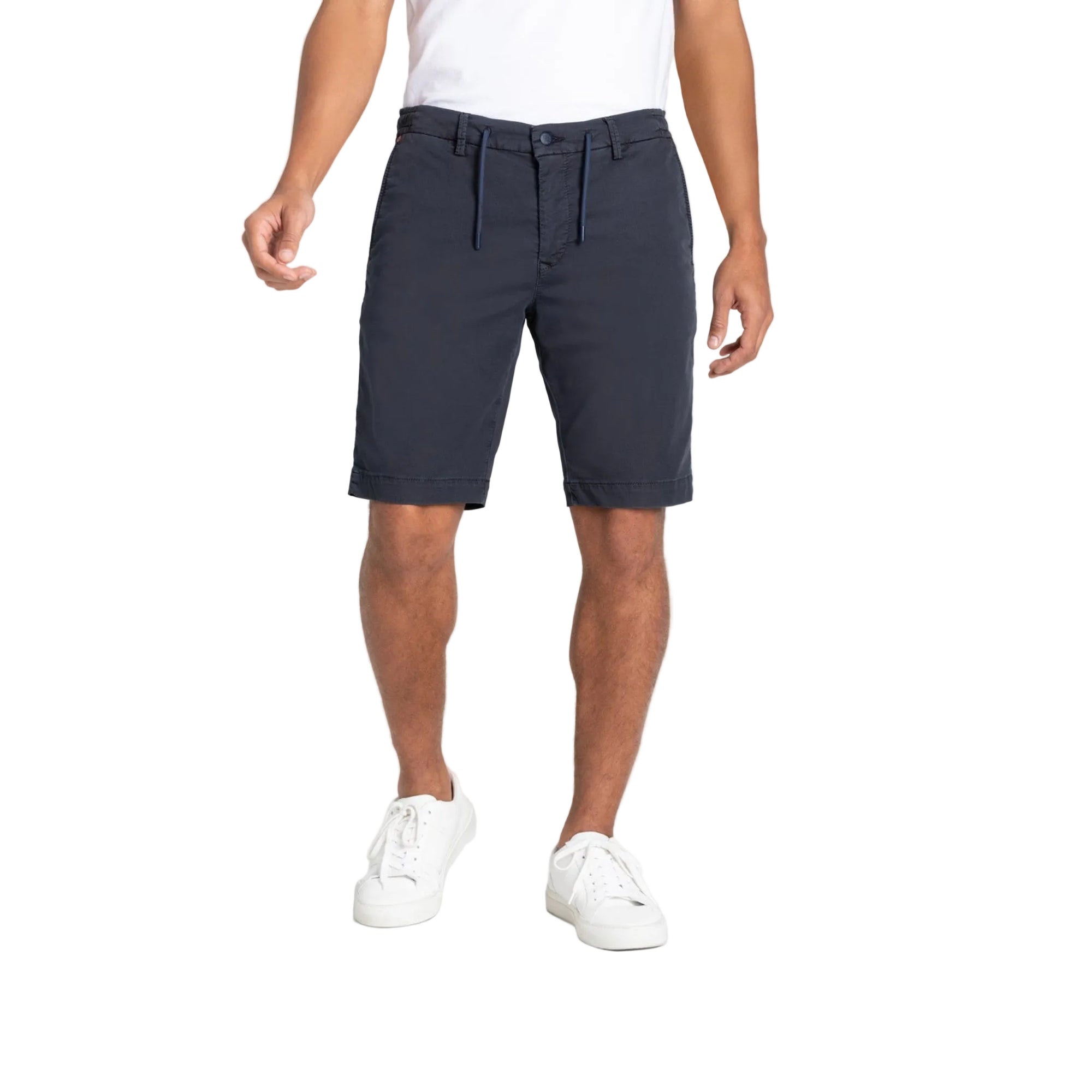 Person wearing navy shorts on a white background