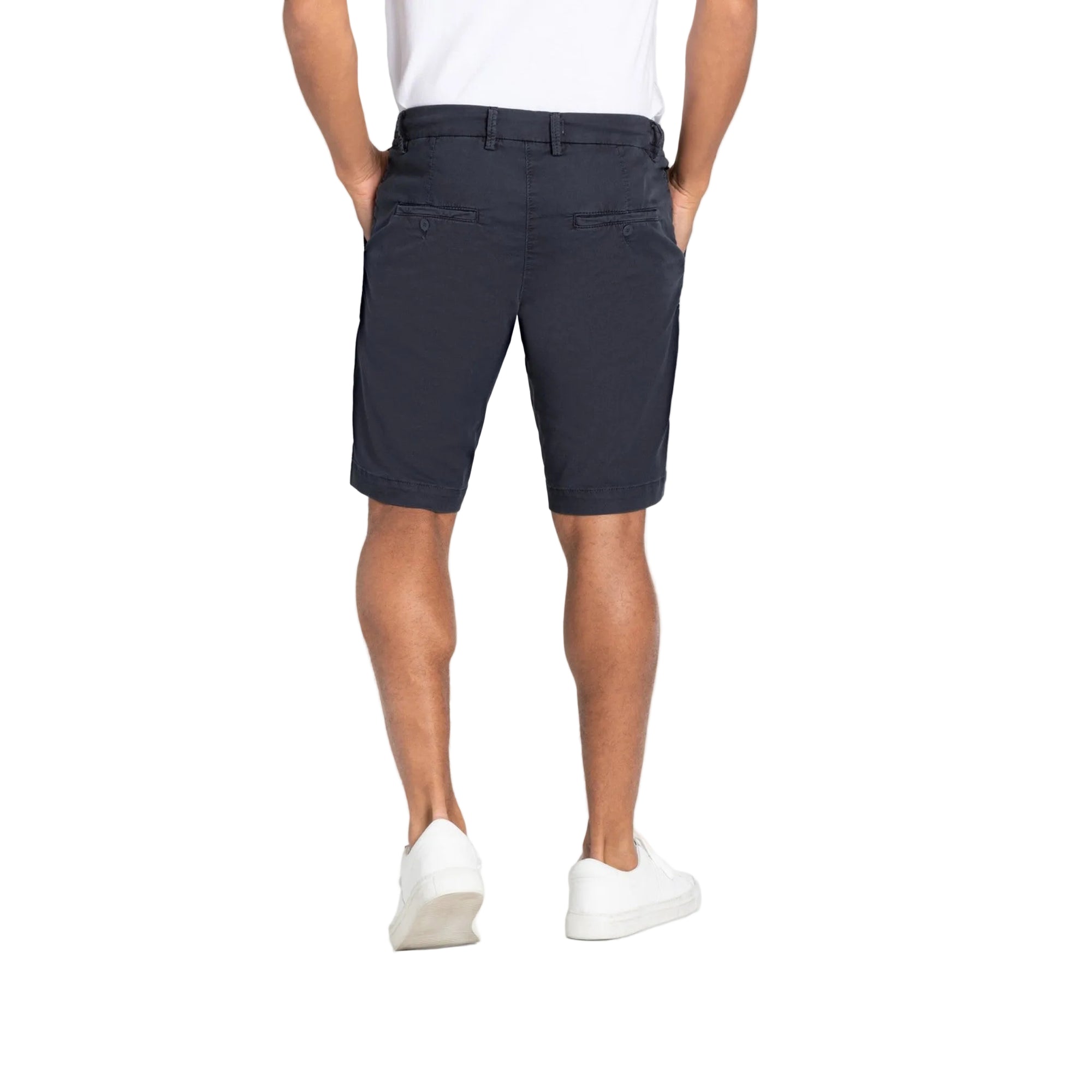 Person wearing navy shorts on a white background