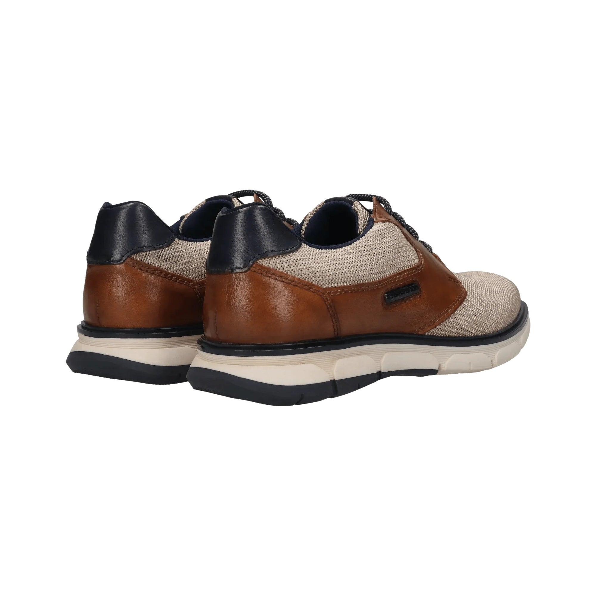 Beige and brown shoe with black laces on a white background