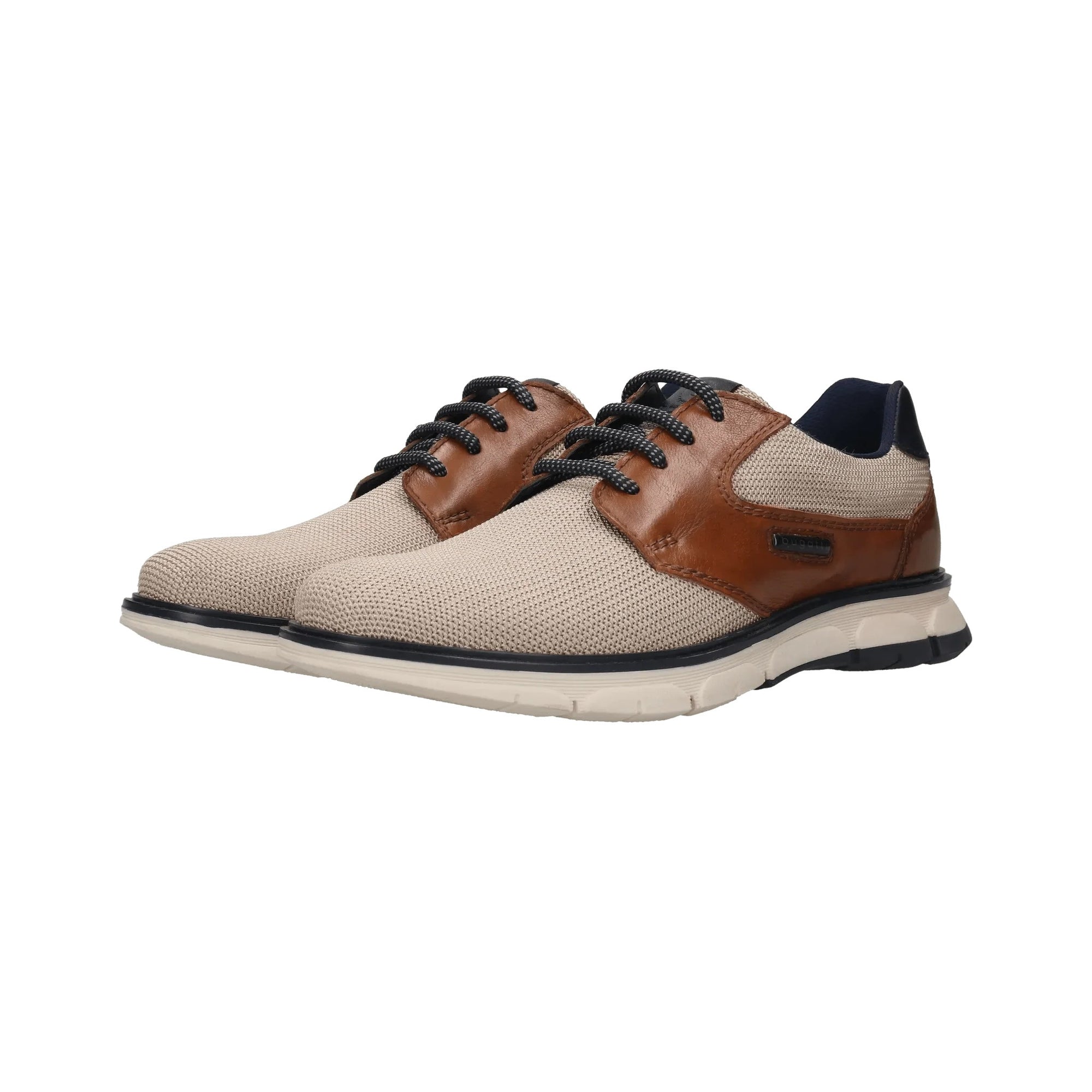 Beige and brown shoe with black laces on a white background