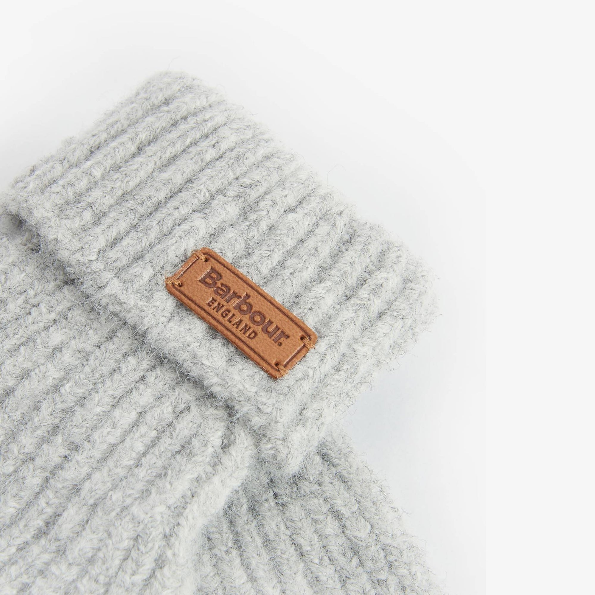 Gray knit beanie with a Barbour England label on a white background