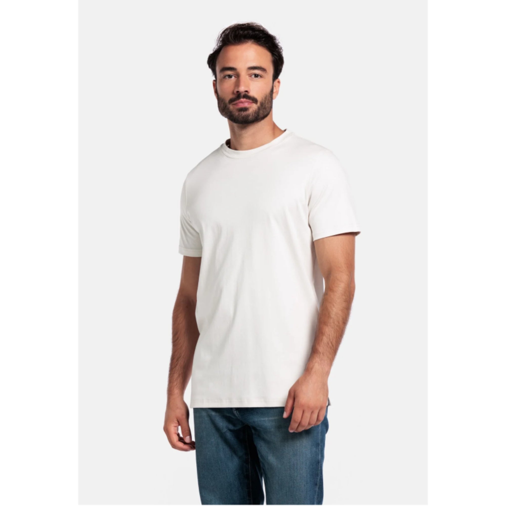 Man wearing a plain Giordano white t-shirt on a white background