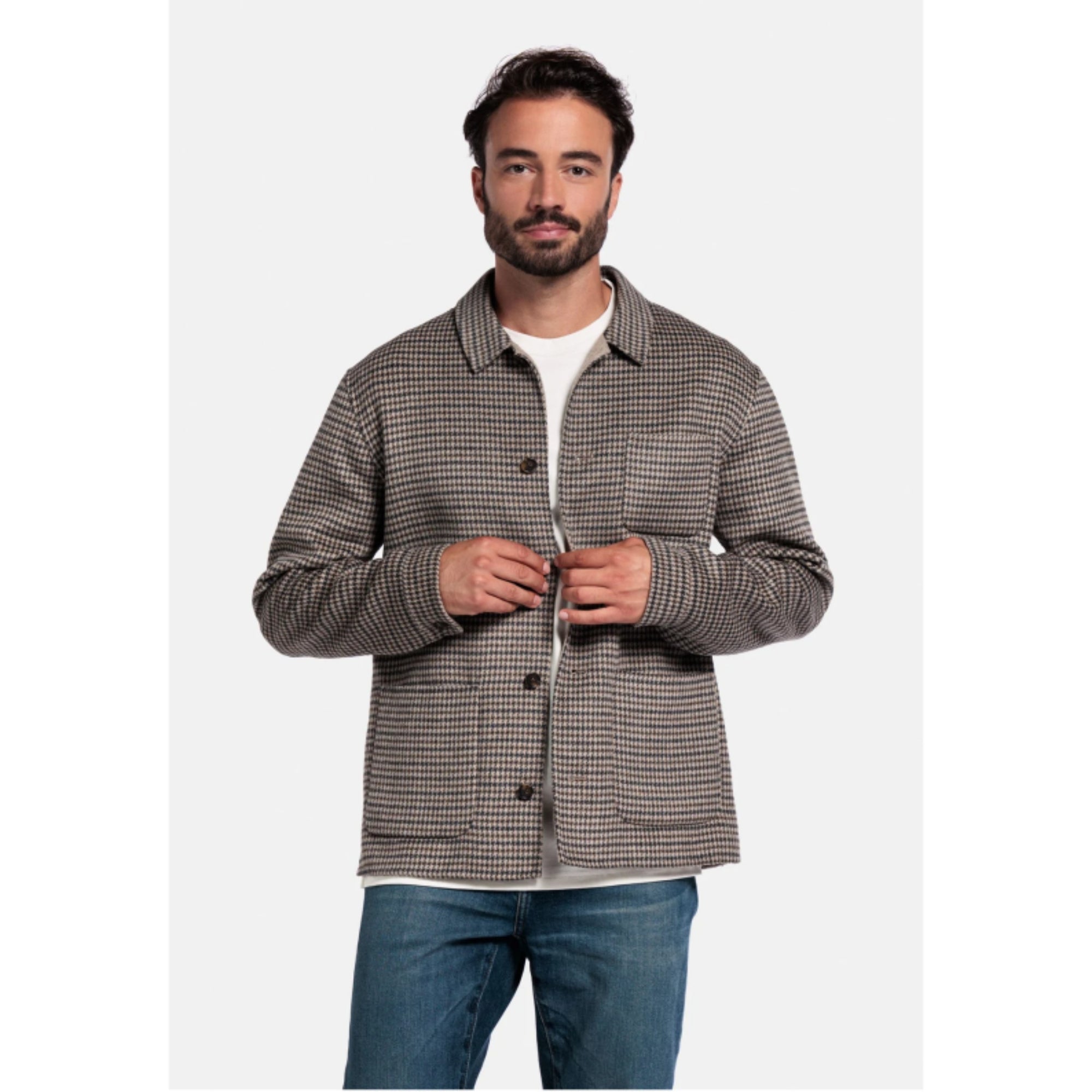 Man wearing a Giordano checkered shirt over a white t-shirt on a white background