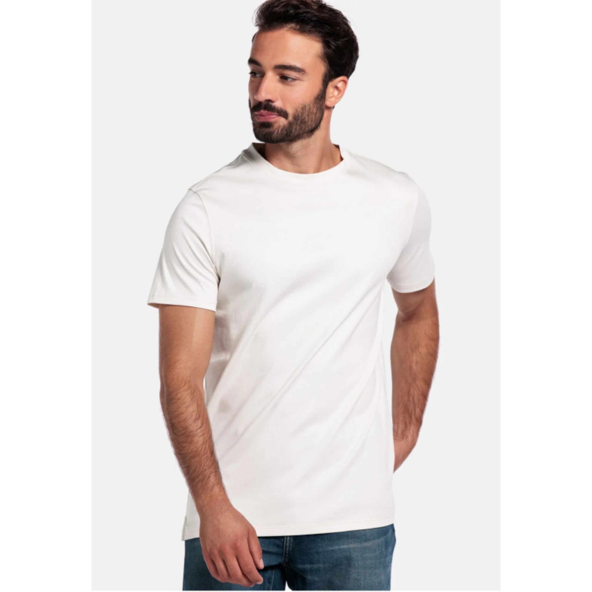 Man wearing a plain white a Giordano t-shirt on a light gray background