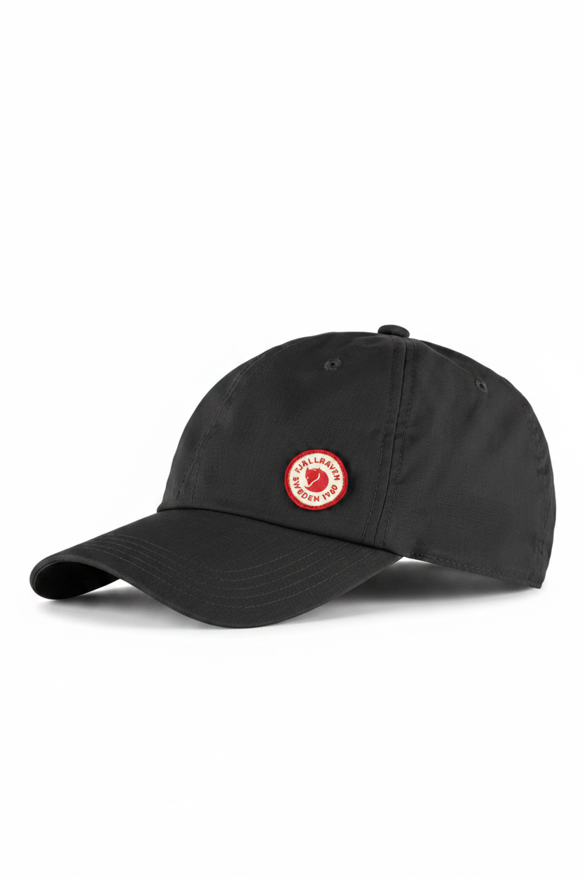 Black cap with a red logo on a white background