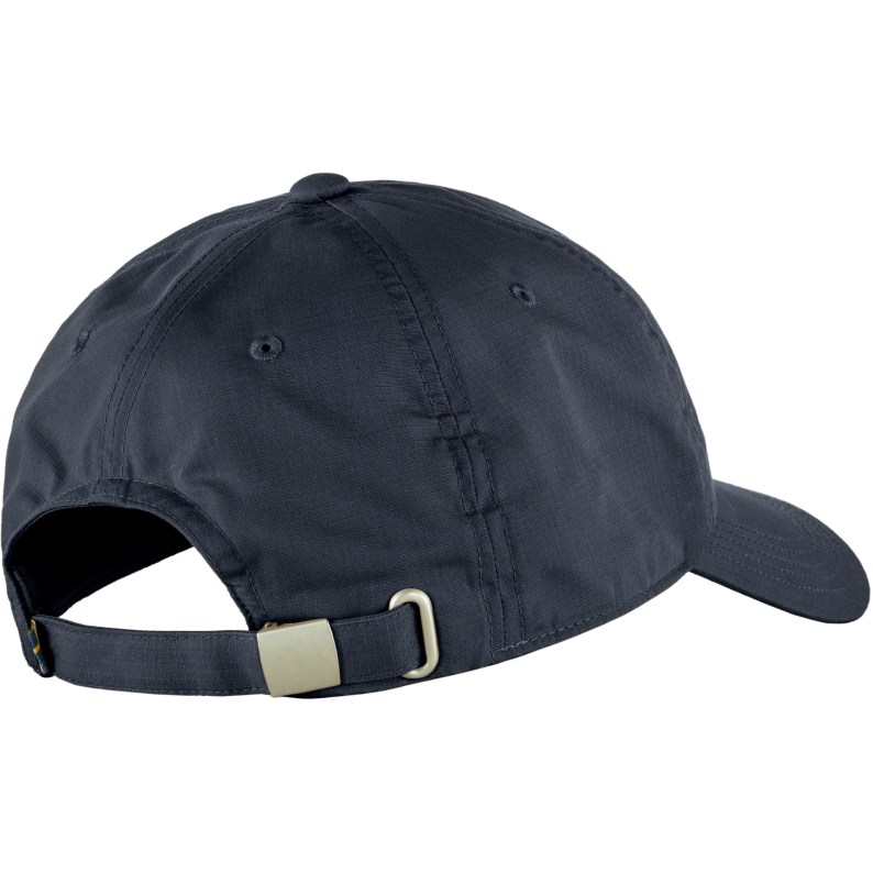 Dark navy cap with a beige buckle on a white background