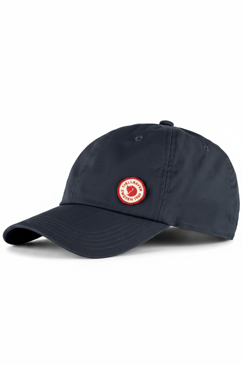 Dark navy cap with a red logo on a white background