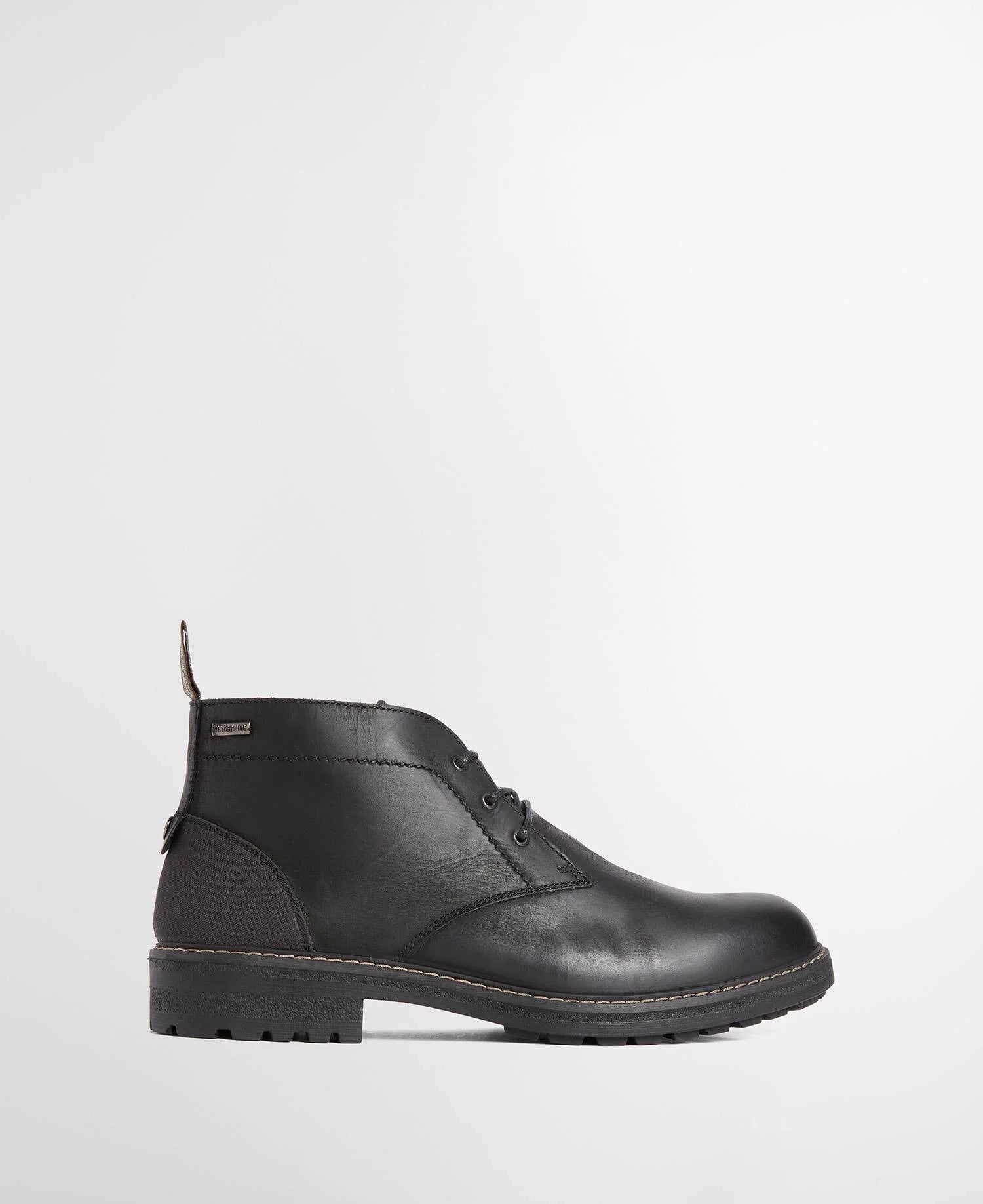 A black Barbour leather lace-up ankle boot with a dark brown sole, shown from a side profile against a clean white background.