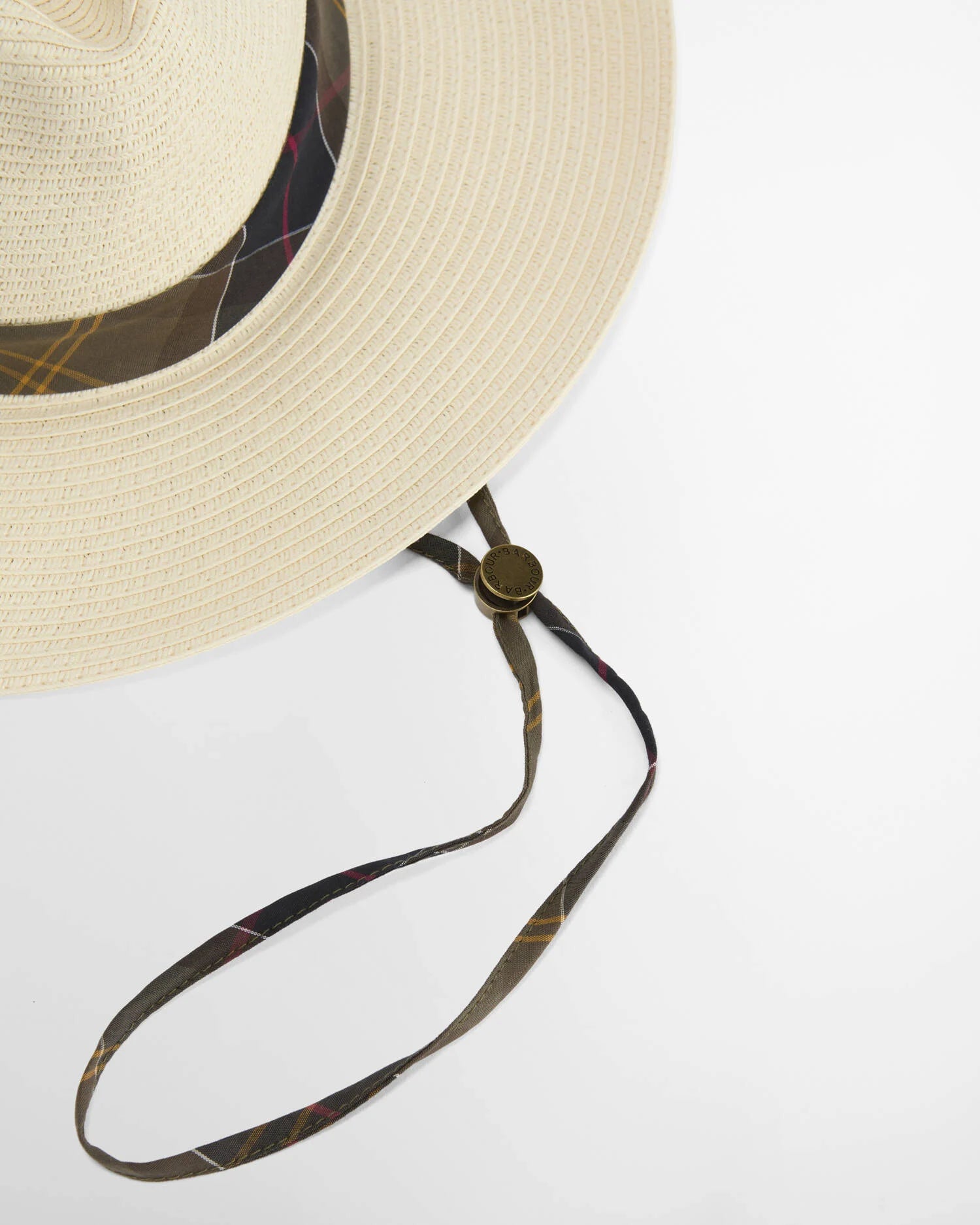 Beige straw hat with a black strap on a white background