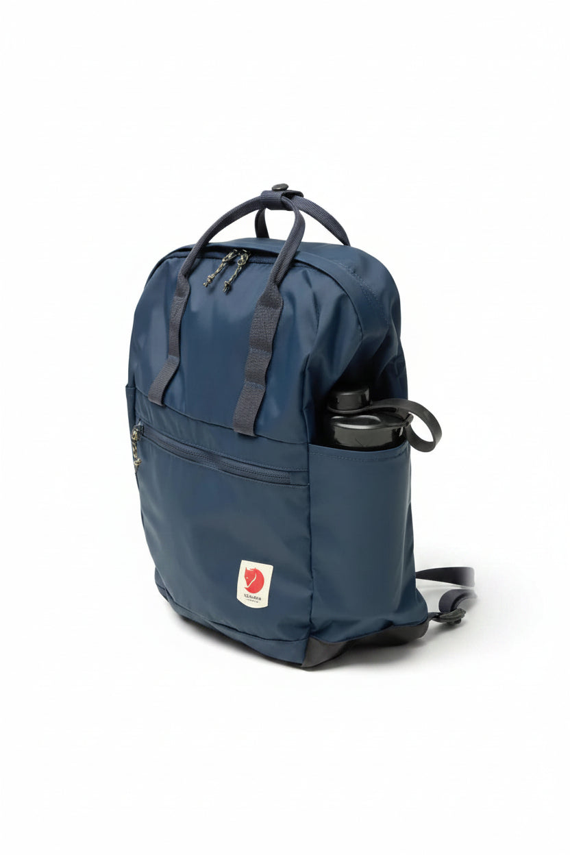 Blue backpack with a visible brand logo on a white background