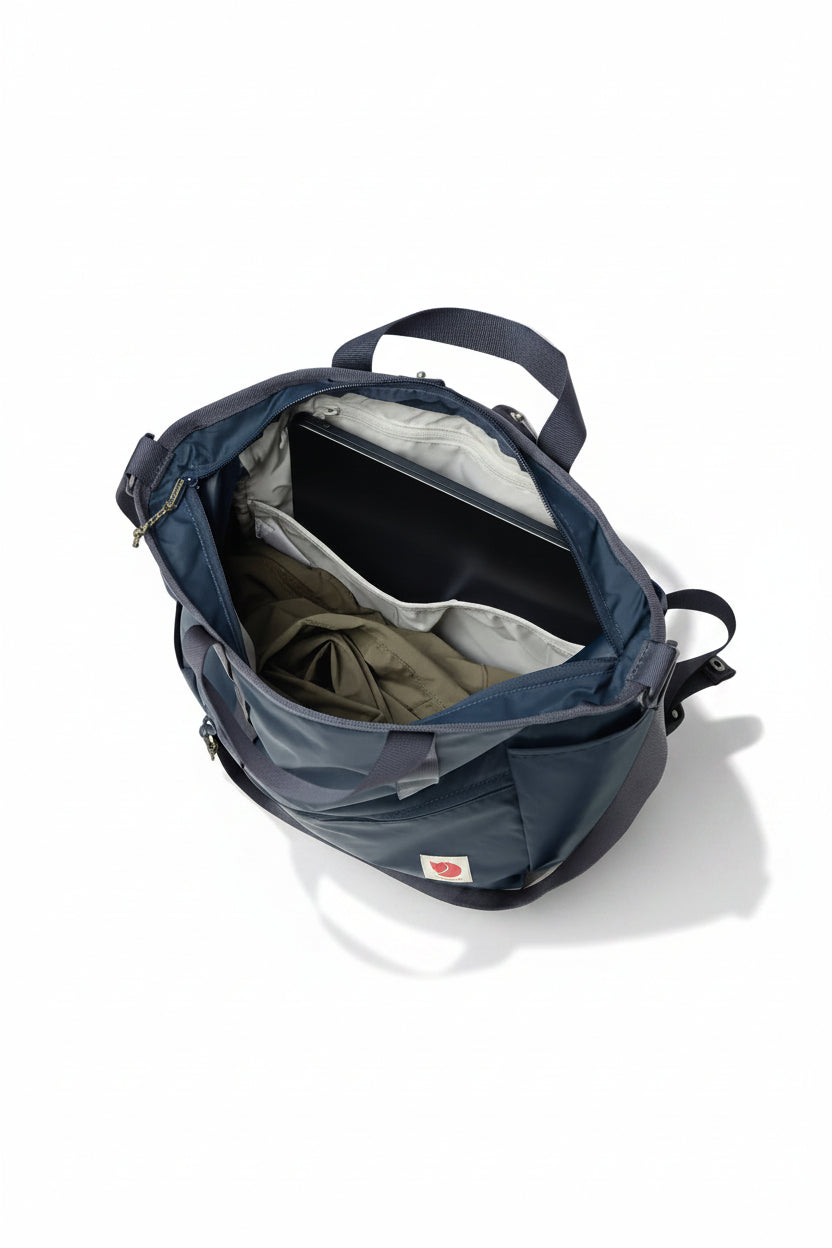 Blue backpack with a visible brand logo on a white background
