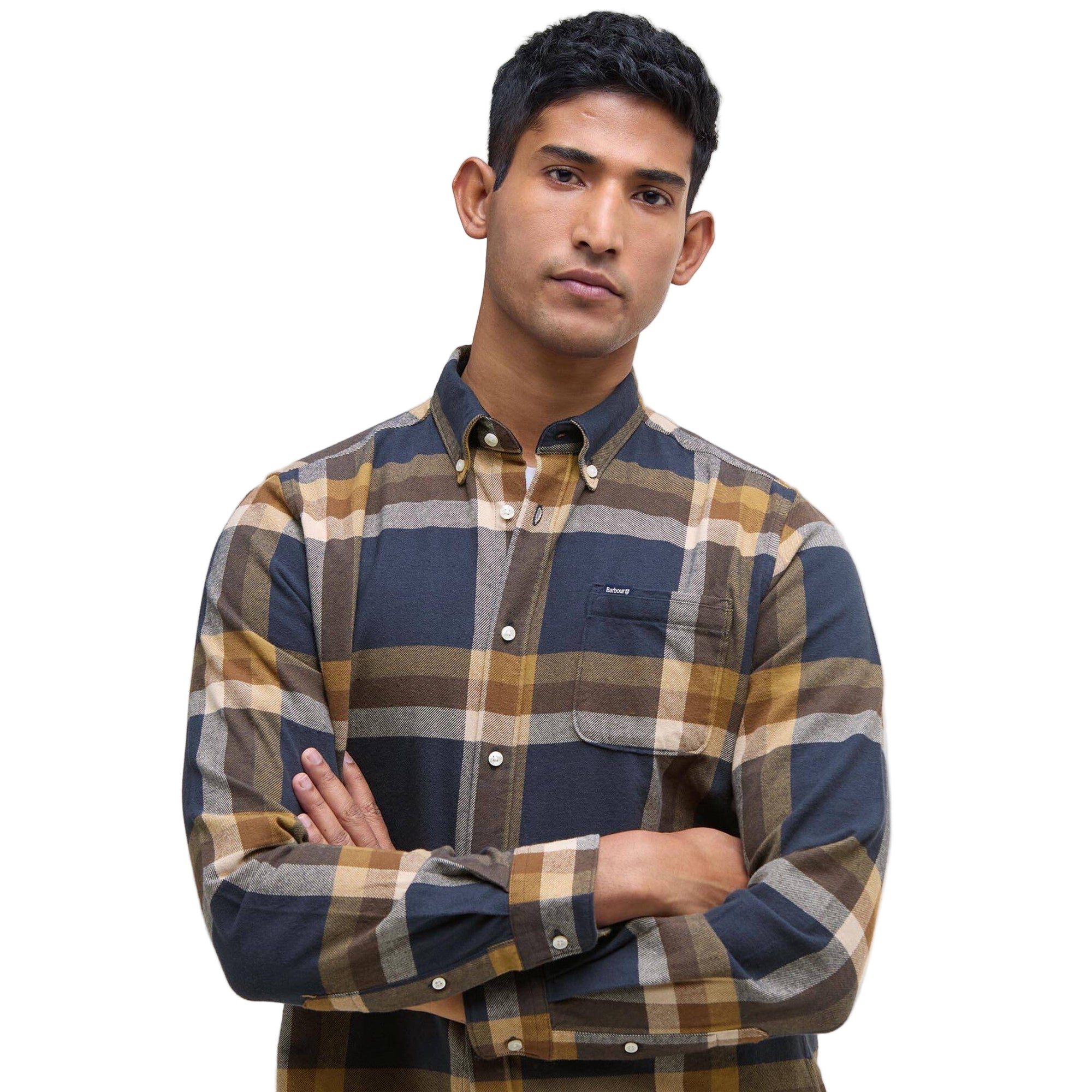 Man wearing a plaid shirt with a neutral background