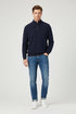 Navy blue sweater with button details on a white background