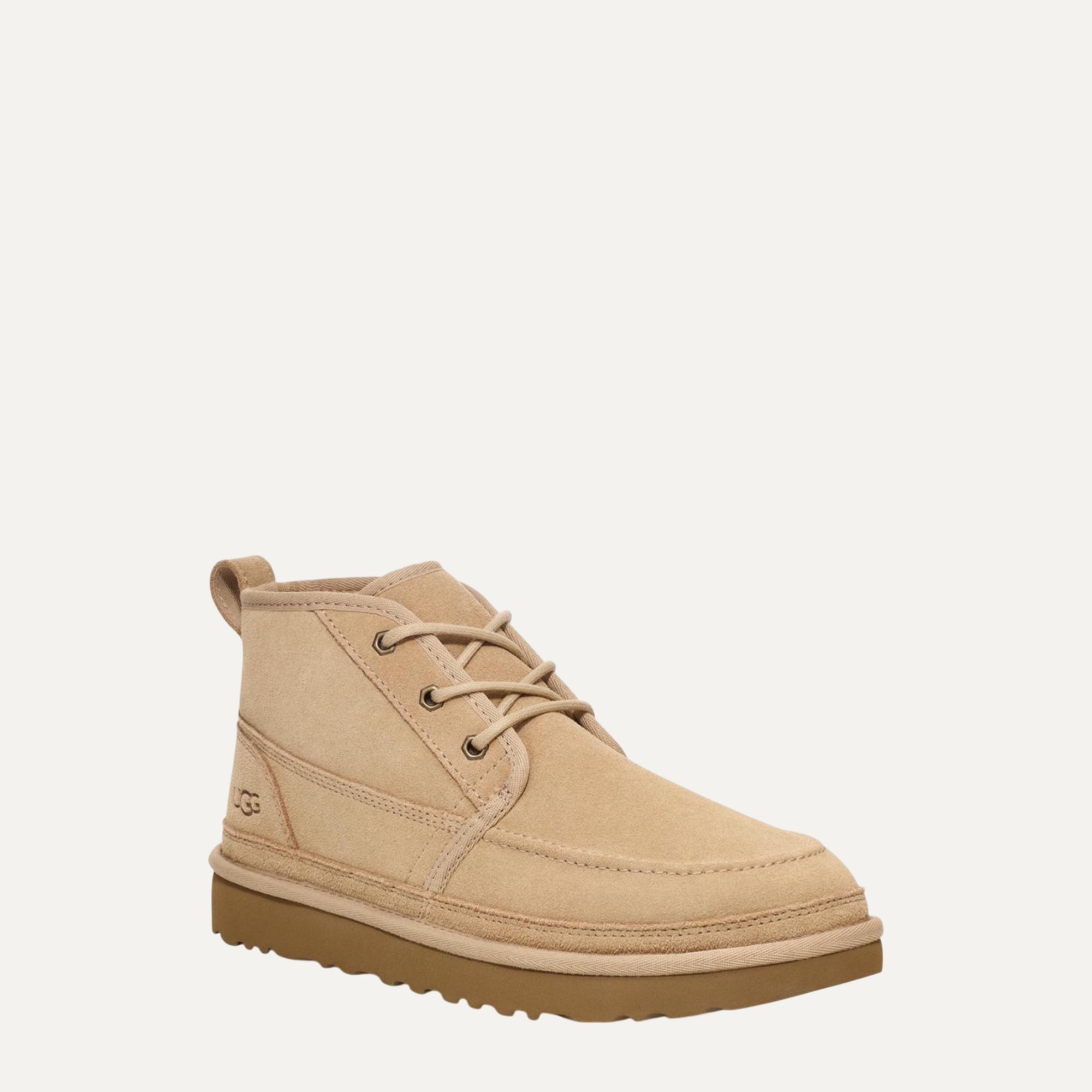Beige suede shoe on a white background